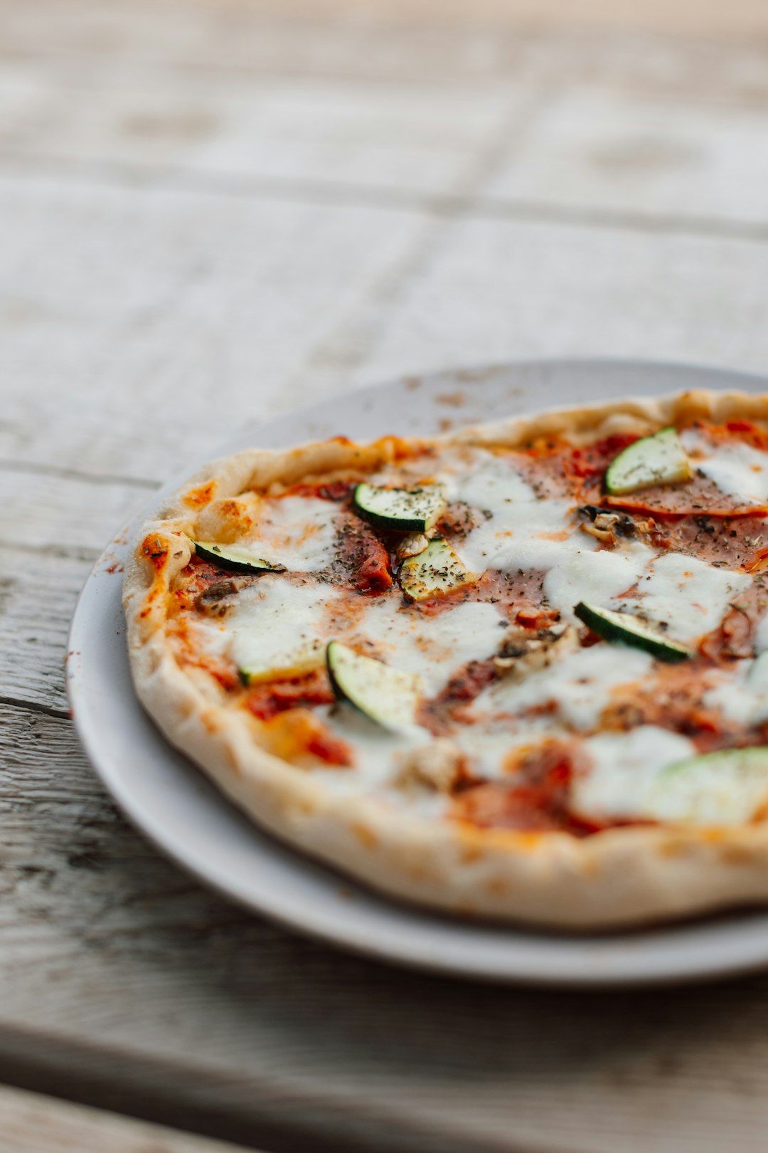 Pizzaiolo chef using whole vegetables to reduce waste