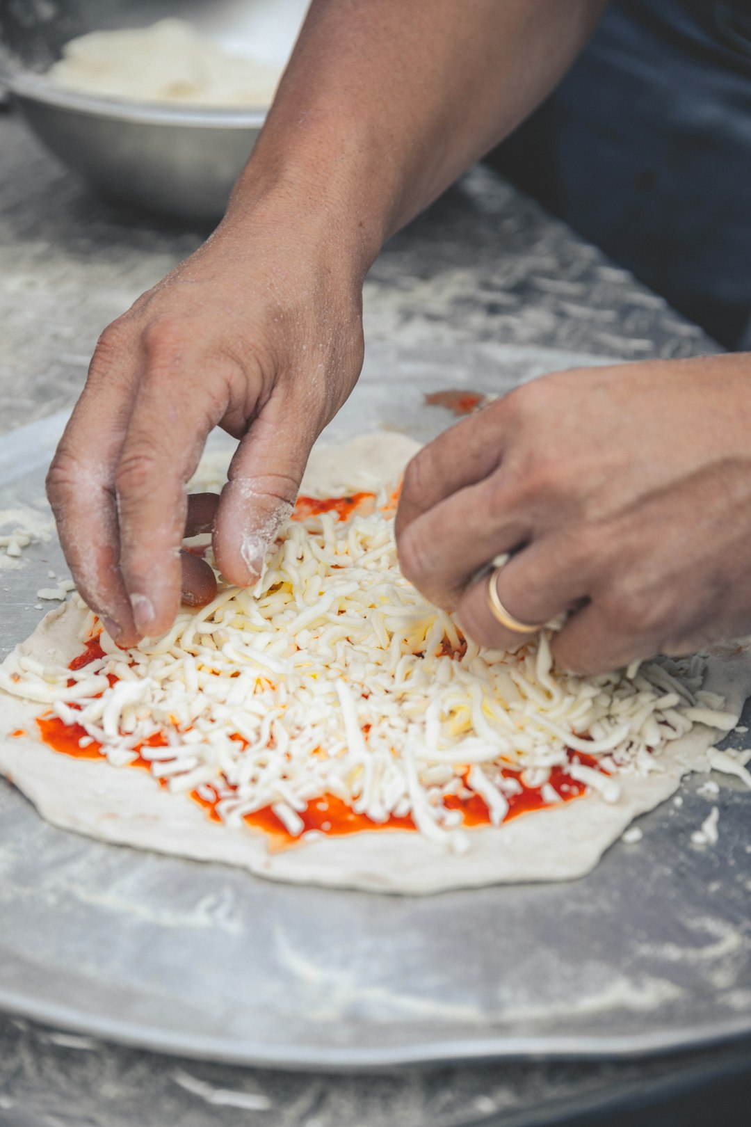 Flour being mixed for pizza dough
